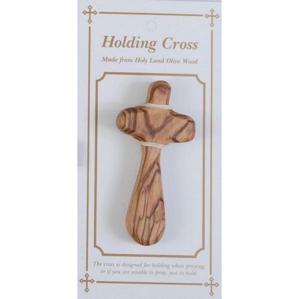 olive wood holding cross comfort cross image